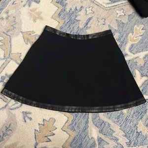 Faux leather trimmed a-line mini skirt